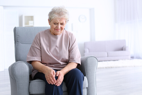 stiff knee after sitting