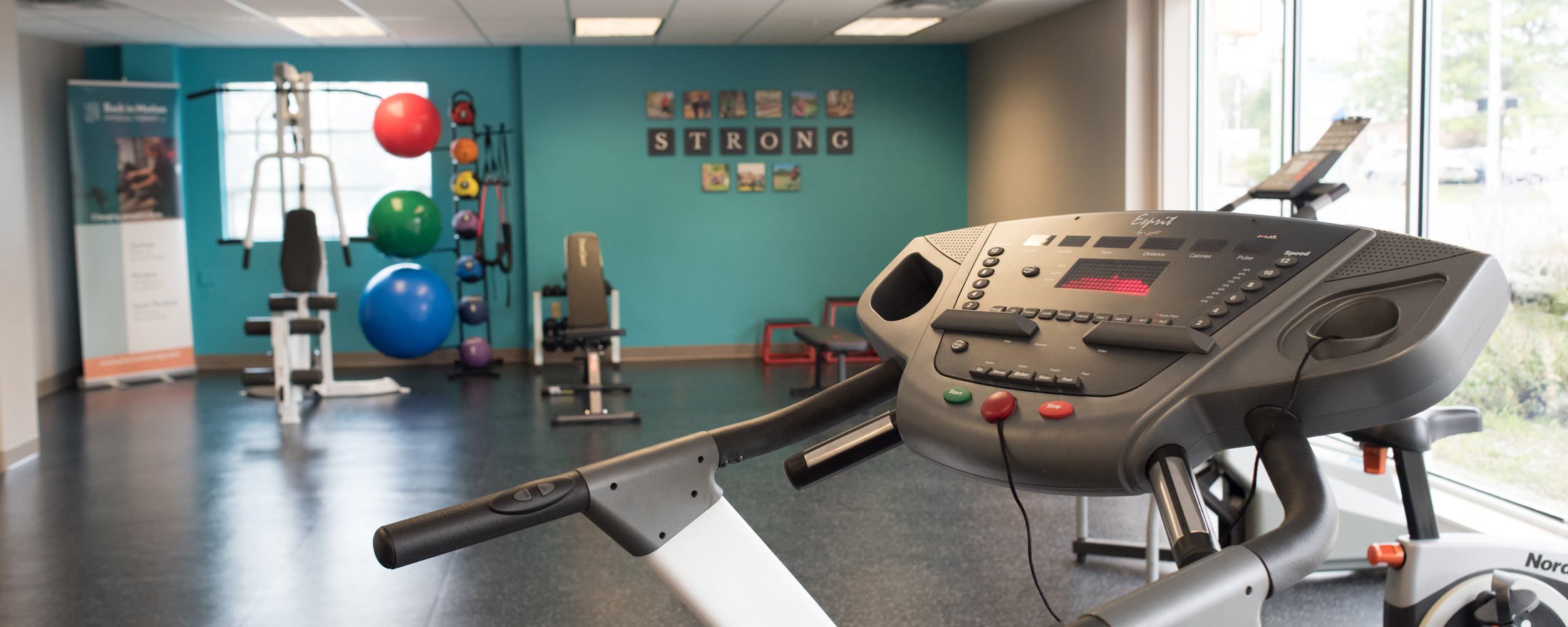 Physical Therapy Team Maine Back In Motion Physical Therapy   South Portland Gym 01 2200x880 1 