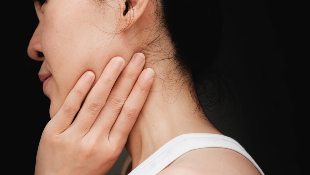 What is causing my neck and jaw pain? shutterstock 781018936 neck and jaw pain