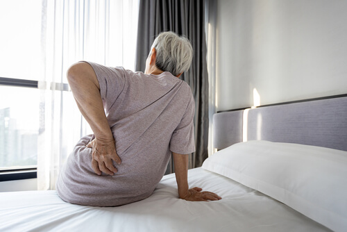 What's causing me hip pain when I'm sleeping on either side? shutterstock 1890730546 hip pain when sleeping on either side