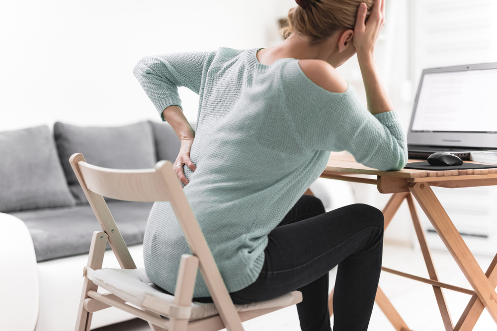 Four ways you could develop latissimus dorsi muscle pain at work shutterstock 1673982841 latissimus dorsi muscle pain