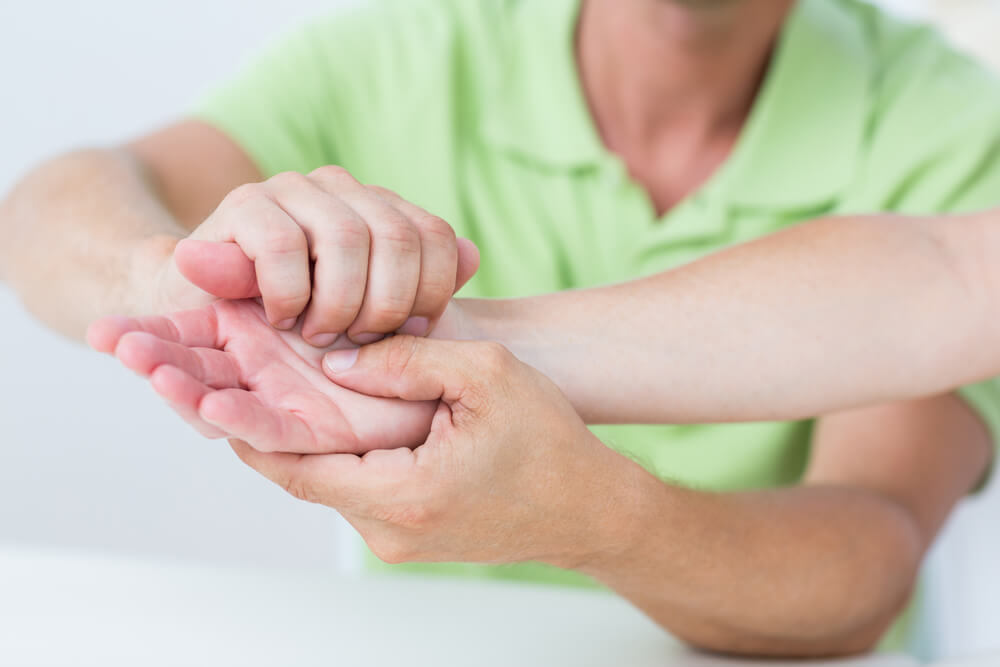 What will a physical therapist do during a thumb arthritis test? shutterstock 273341636 thumb arthritis test