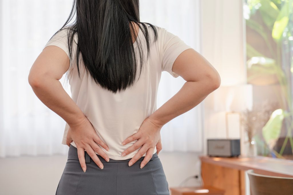 What Does SI Joint Pain Feel Like? AdobeStock 1183484936 what does si joint pain feel like? back pain